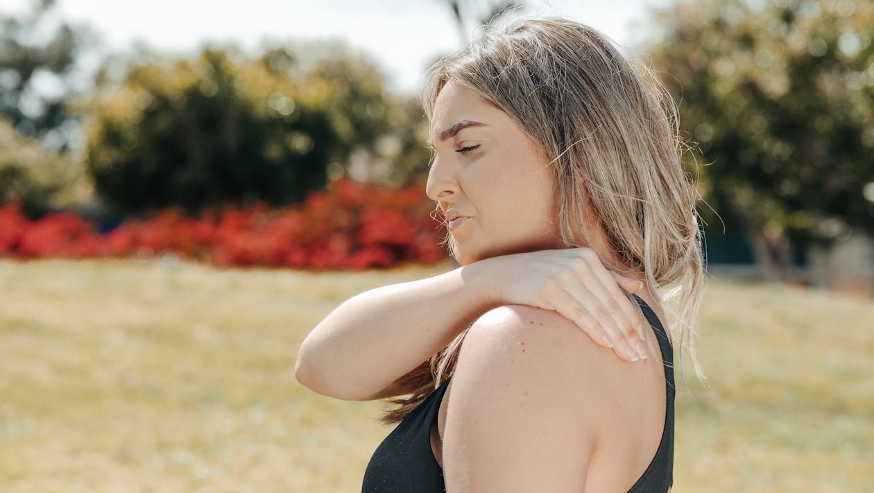 Woman in Black Tank Top