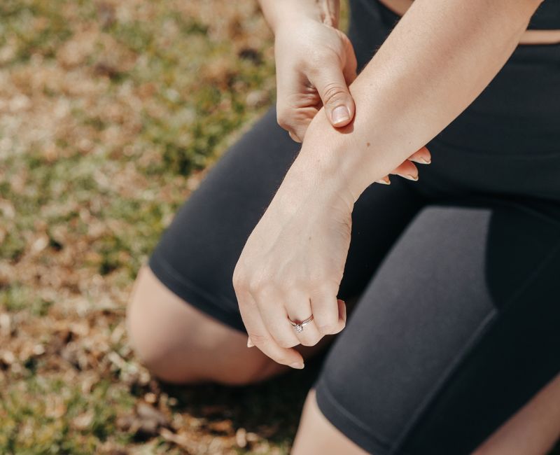 Close-up view of Super Patch on a person's arm in an athletic setting