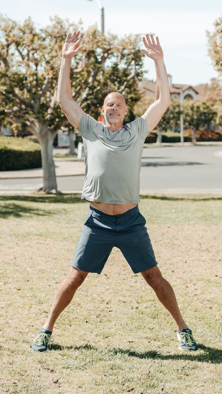 Man Doing Jumping Jacks