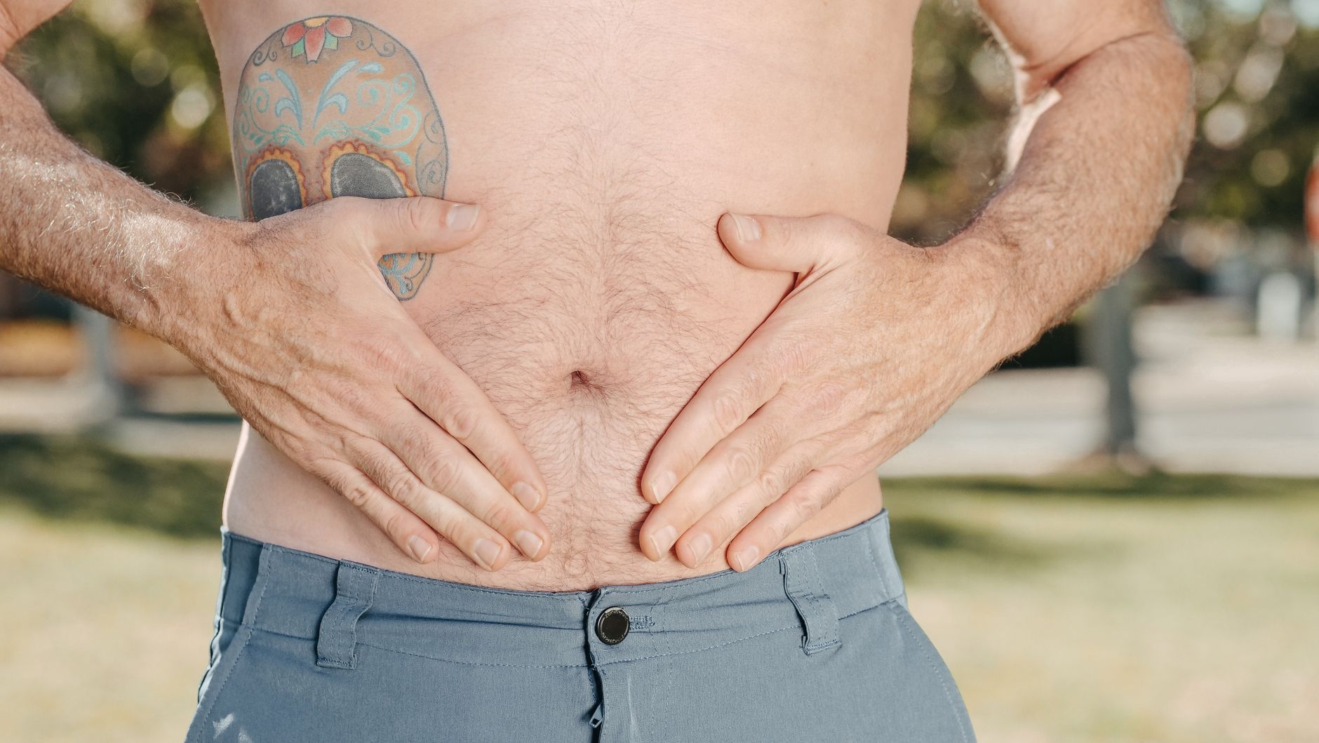 https://www.pexels.com/photo/a-person-holding-his-stomach-7298433/