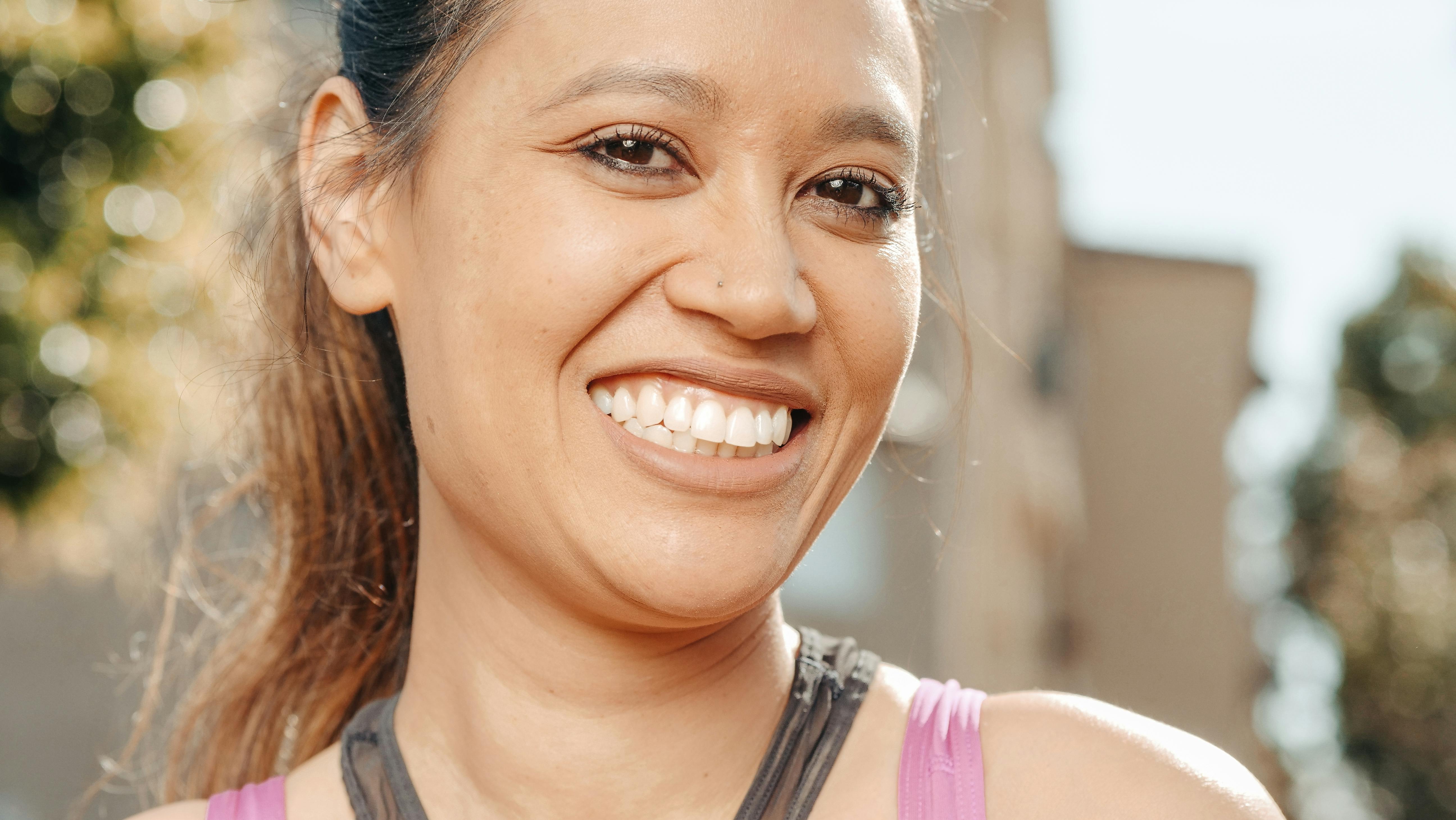 Woman wearing sunglasses, representing sun protection for eyes