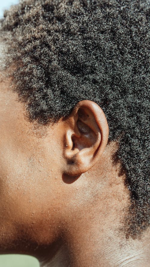 Close Up Photo of Person's Ear 