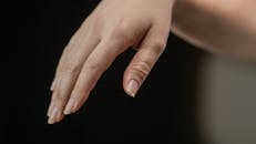 Close Up Photo of Person's Hand