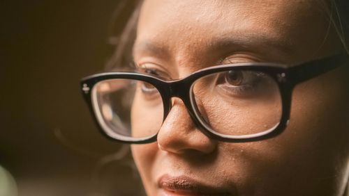 Free Detailed close-up of a person wearing eyeglasses, showcasing focus and contemplation. Stock Photo
