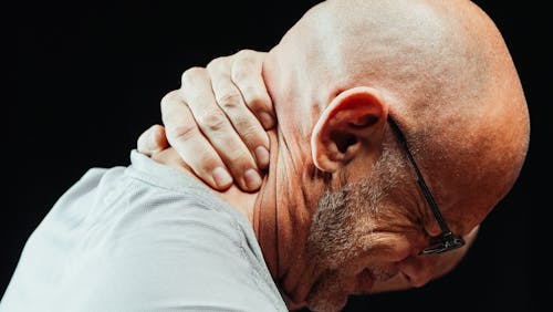 Free Close-Up Photo of a Man Having a Neck Pain Stock Photo