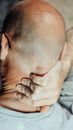 A Man Massaging His Nape