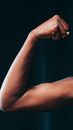A Person Flexing Her Biceps