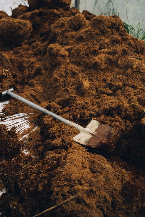 Free A Shovel on Brown Dirt Ground Stock Photo