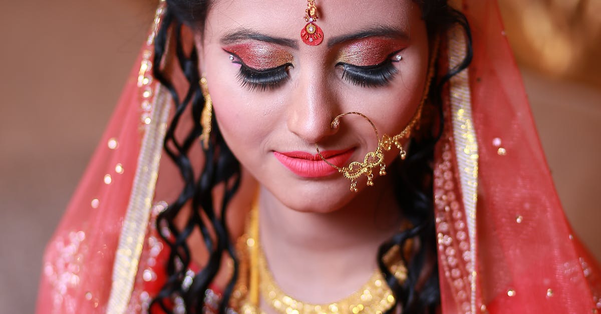 Selective Focus Photography of Woman Wearing Traditional Dress With Gold-colored Accessories