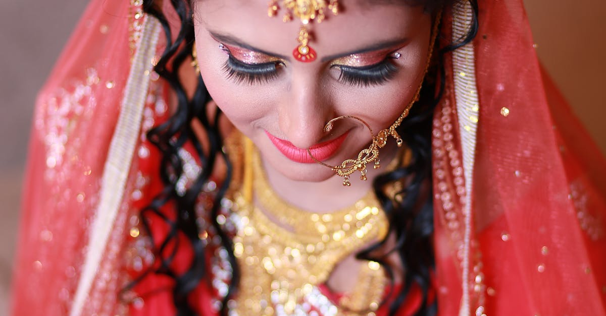 Selective Focus Photography of Woman Wearing Traditional Dress