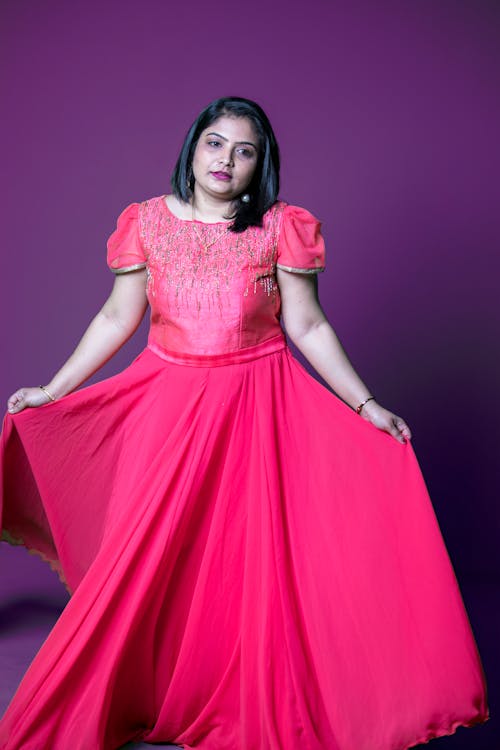 Free A Woman Wearing a Pink Gown Stock Photo