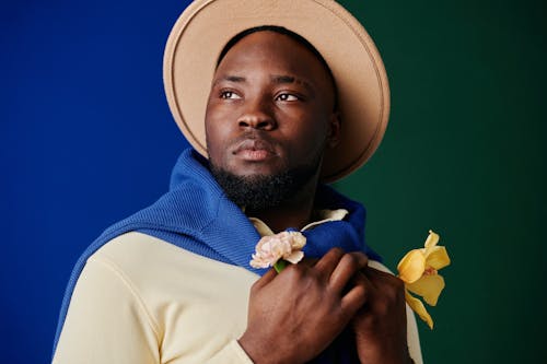 Close Up Photo of a Man Wearing Hat