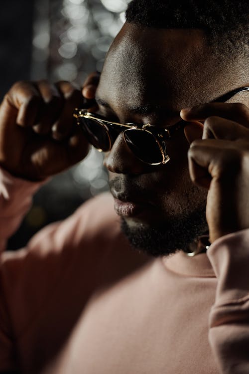 Man Wearing Sunglasses in Close Up Photography