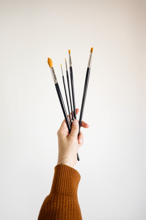 54,500+ Hand Holding Paintbrush Stock Photos, Pictures & Royalty