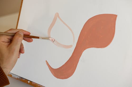 A Painter Using a Paint Brush in Painting