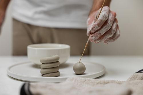 Free Close-up of person crafting with clay, showcasing creative handwork and craftsmanship. Stock Photo