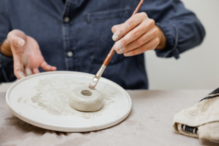 Unrecognizable Person Making Ceramic Ring