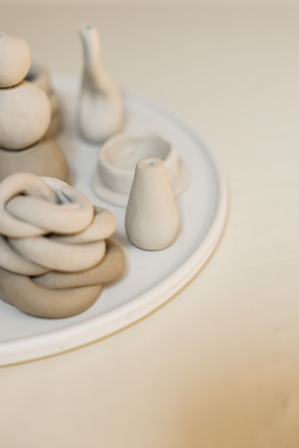 Handcrafted ceramics on a beige ground, by Cup of Couple on Pexels