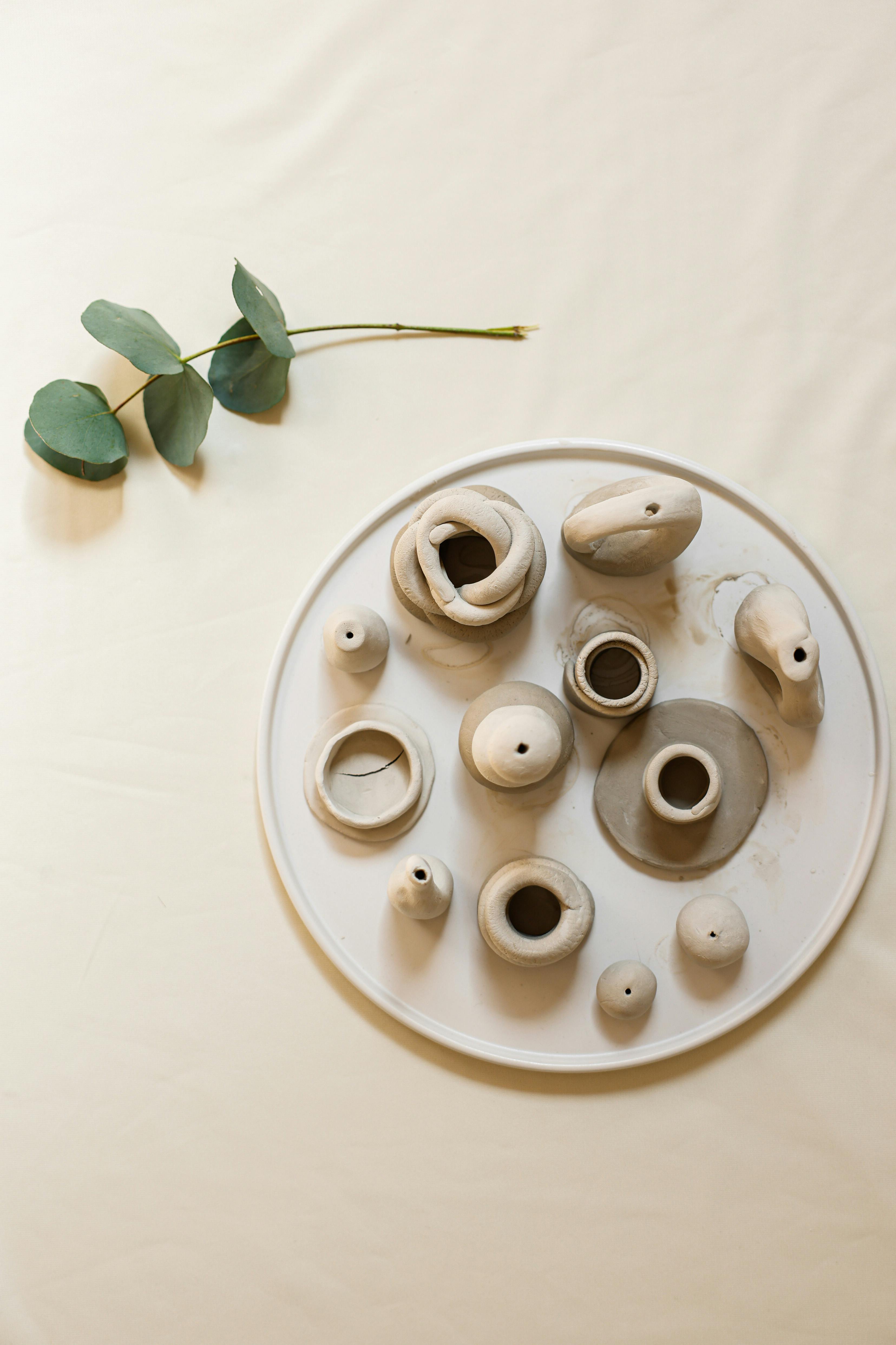 Ceramic Candle Holders on the Plate · Free Stock Photo
