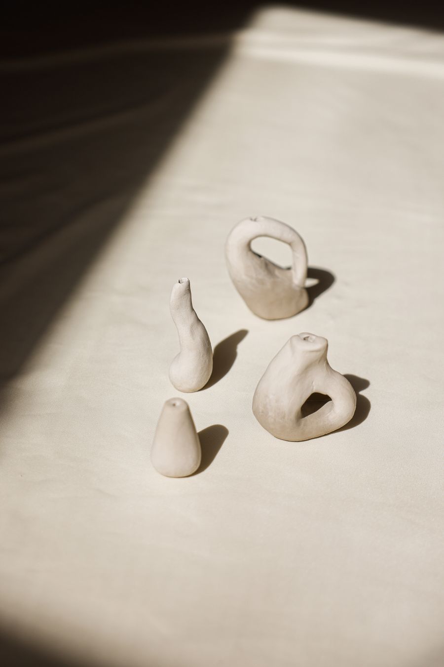 Small smoky-blue hand-built clay vase
