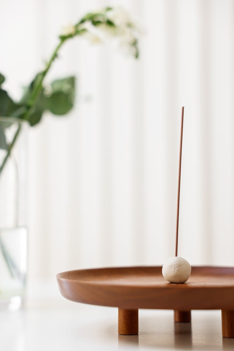 Photo Of A Stick In A Clay Ball