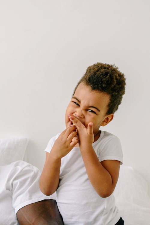 
A Boy Wearing a White Shirt