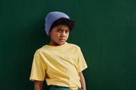 Boy in Yellow Crew Neck T-shirt and Blue Knit Cap