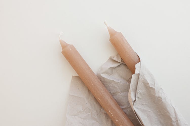 Brown Candlesticks Wrapped On Paper