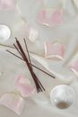 Brown Wooden Stick on White Ceramic Plate
