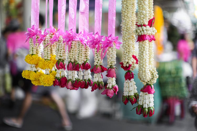 Beautiful Leis With Pink, White And Yellow Flowers