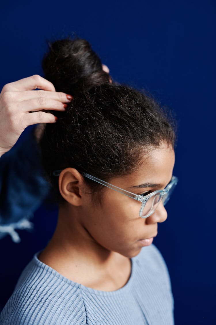 Girl With A Hair Bun