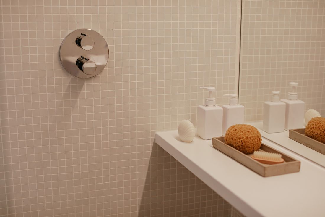 Bathroom decor inspiration photograph for 8. Amber Soap Bottles