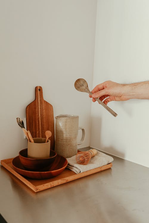 Free A Person Holding a Wooden Spoon Stock Photo
