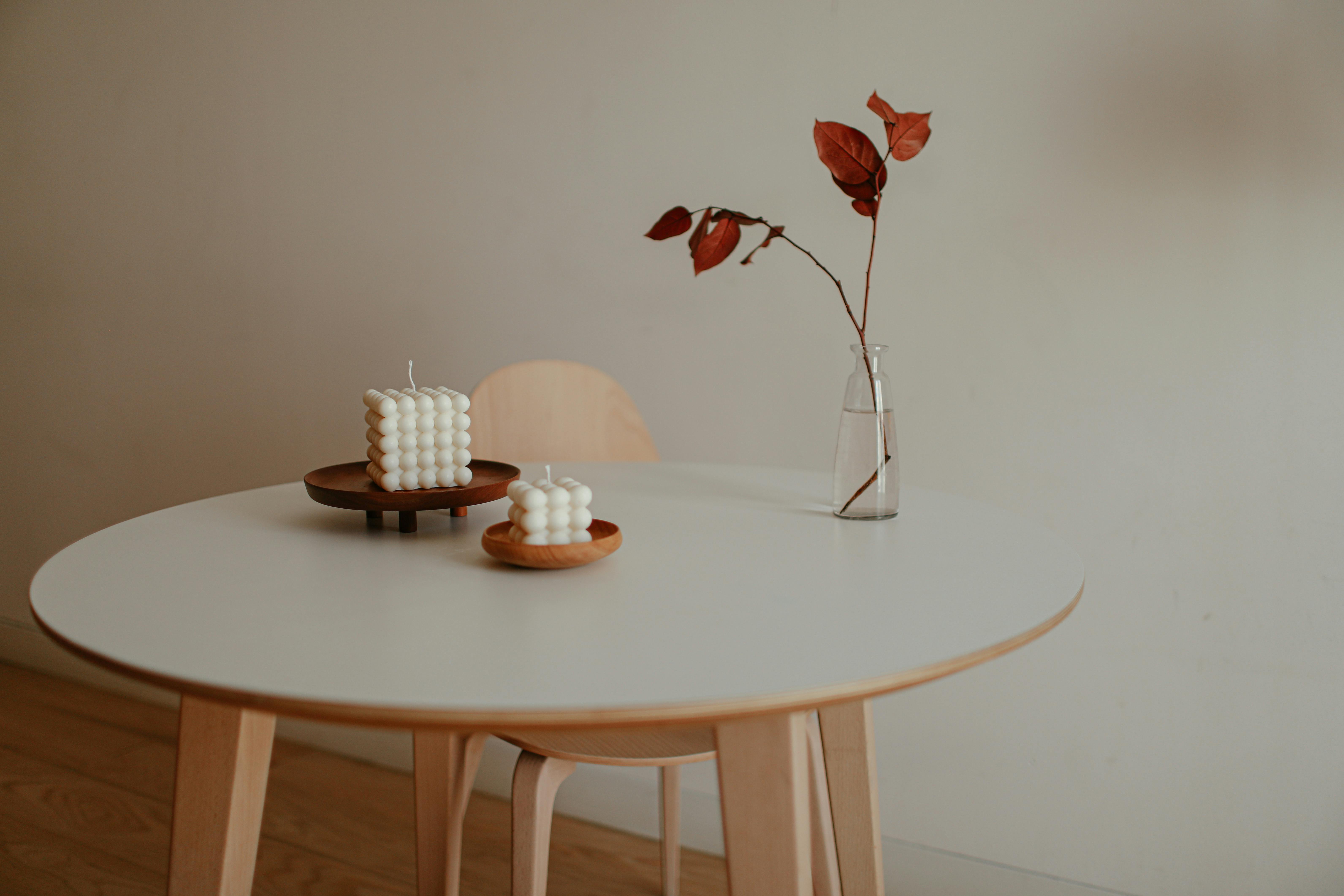 Minimalist table with industrial-inspired design and simple table setting