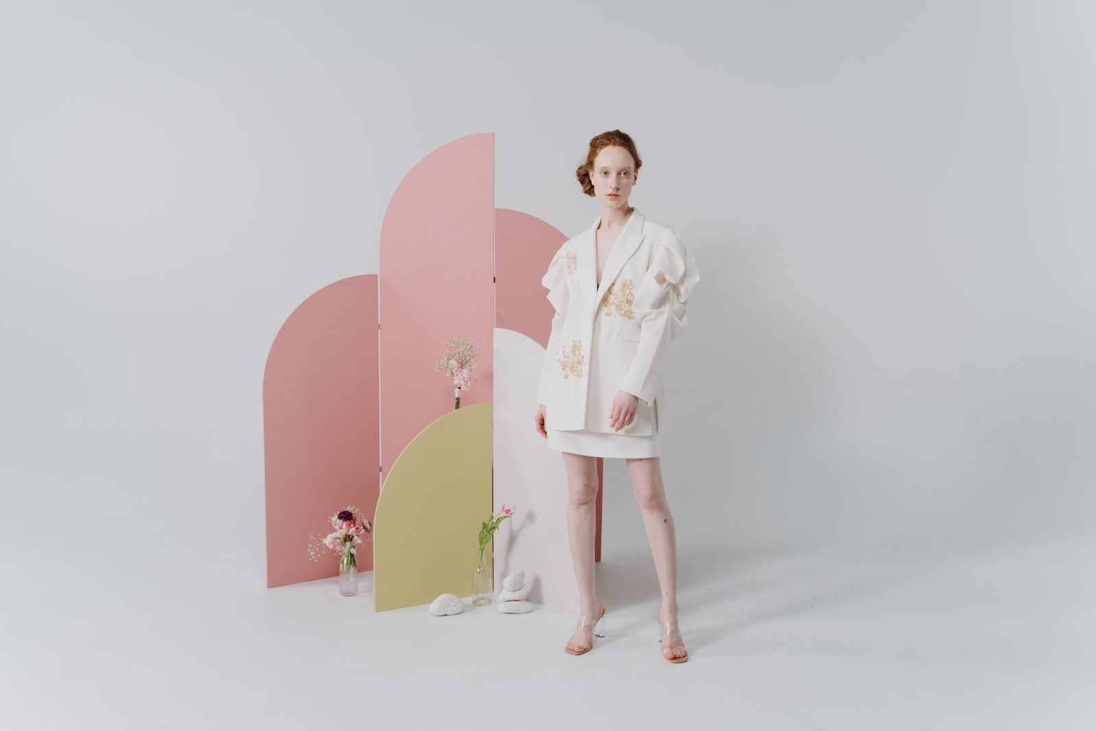 elegant woman in fashion editorial pose minimalist