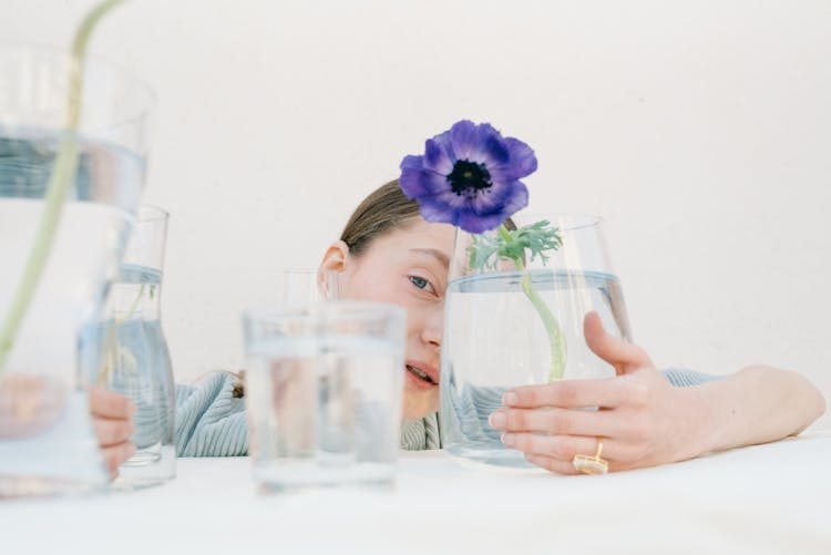 Girl And Vase With Flower