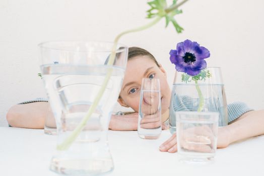 Woman behind Glass Items