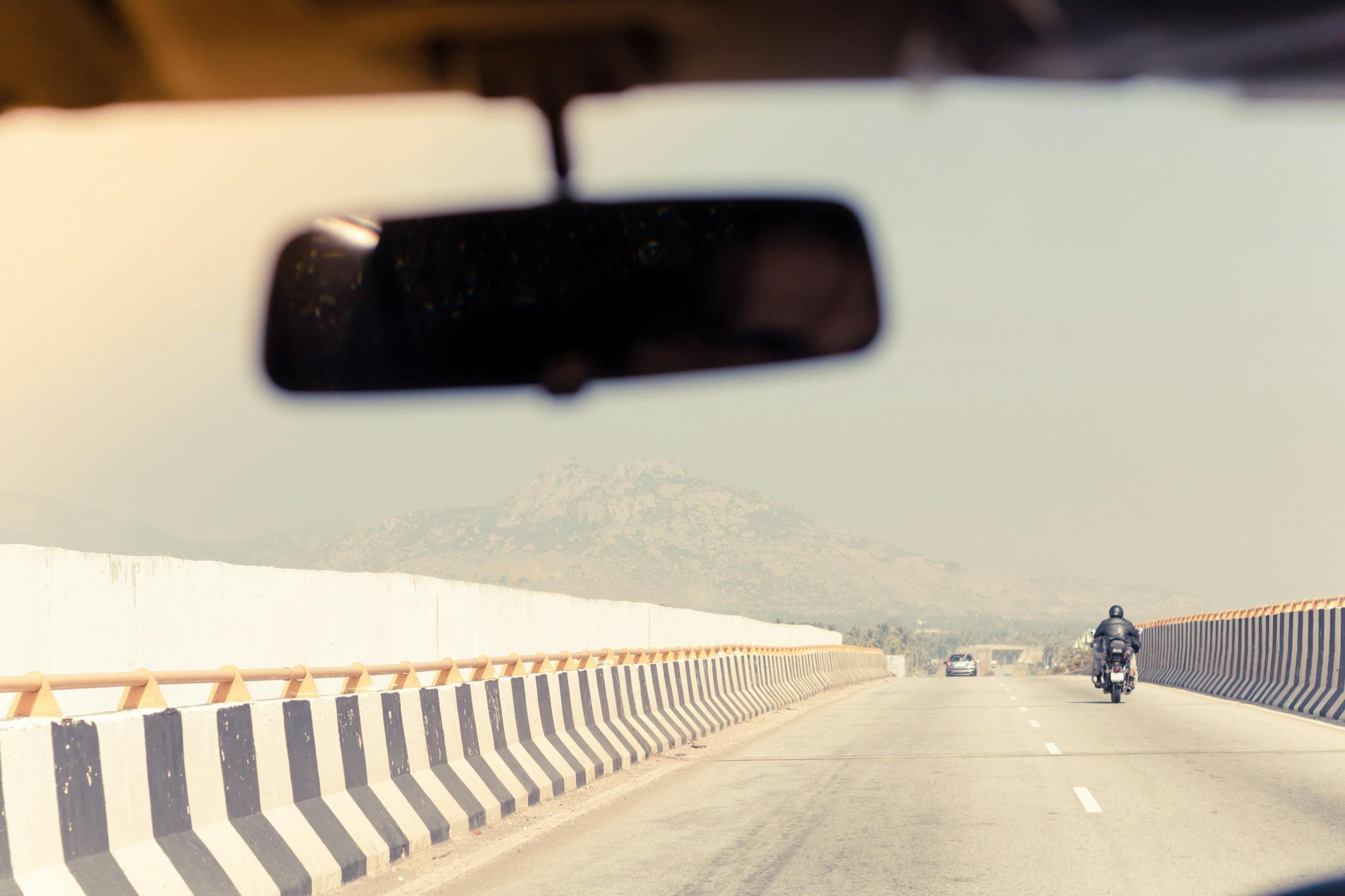 Free stock photo of biker, bridge, car