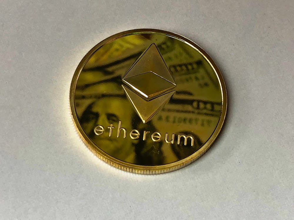 Free Round Gold-colored Ethereum Ornament Stock Photo