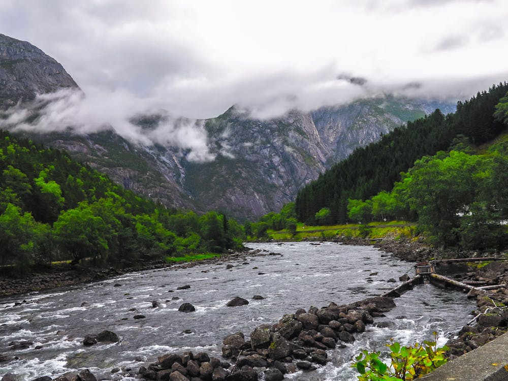 Free Calm River Near Mountains Stock Photo