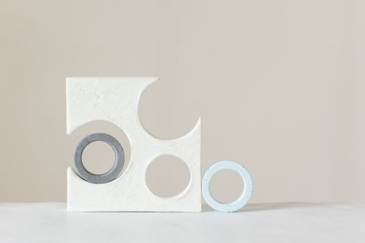 Abstract minimalist art piece featuring geometric shapes and muted tones.