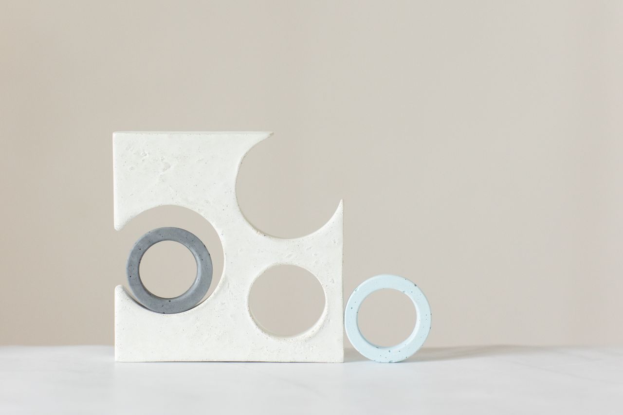 abstract minimalist art piece featuring geometric shapes and muted ton