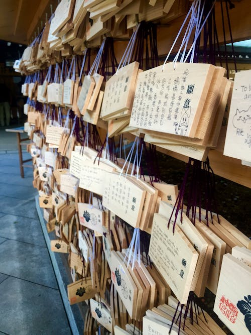 Free Rows of various wooden Shinto wish boards Stock Photo