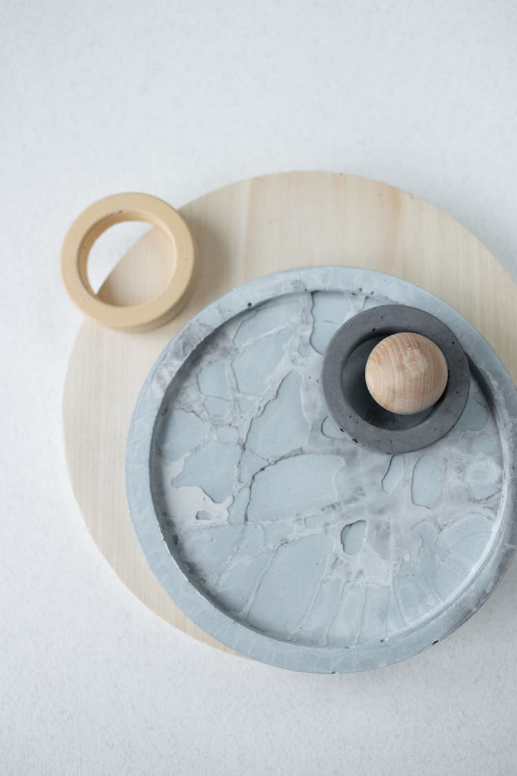 Trays, Circles And A Wooden Bead