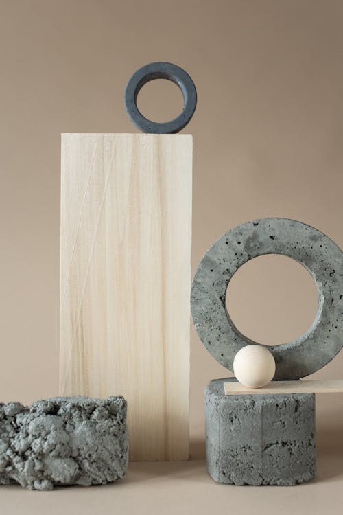 Concrete Geometrical Figures and Wooden Items Composition 