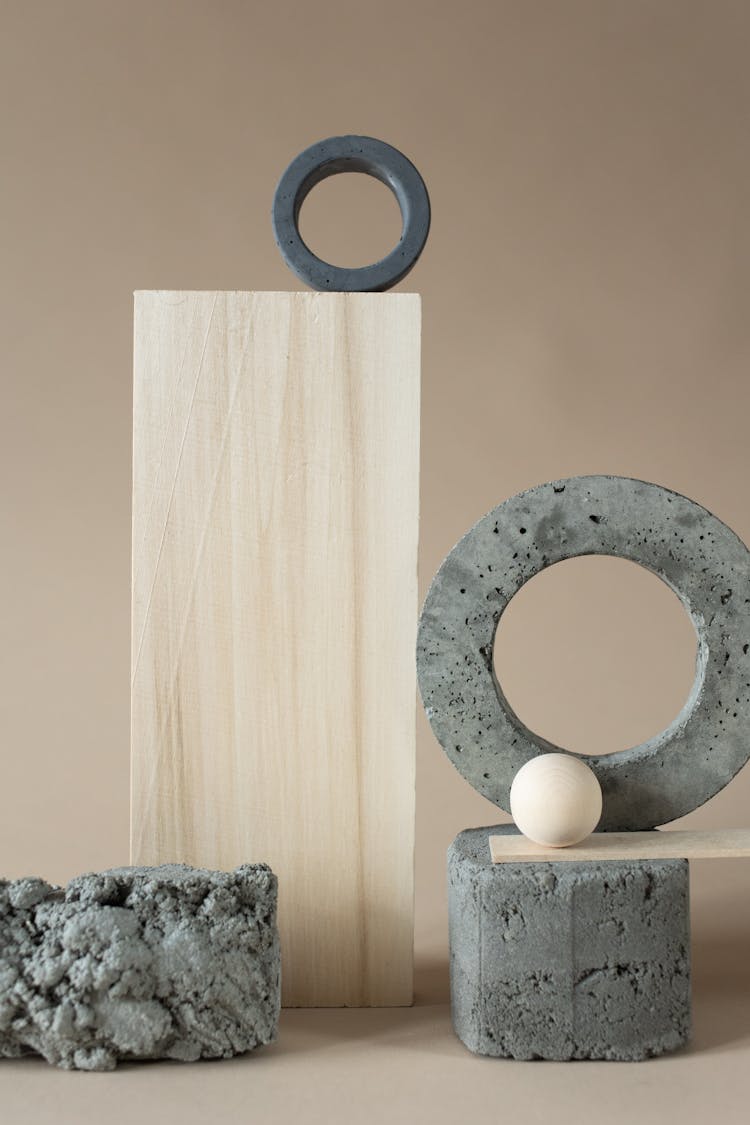 Concrete Geometrical Figures And Wooden Items Composition 