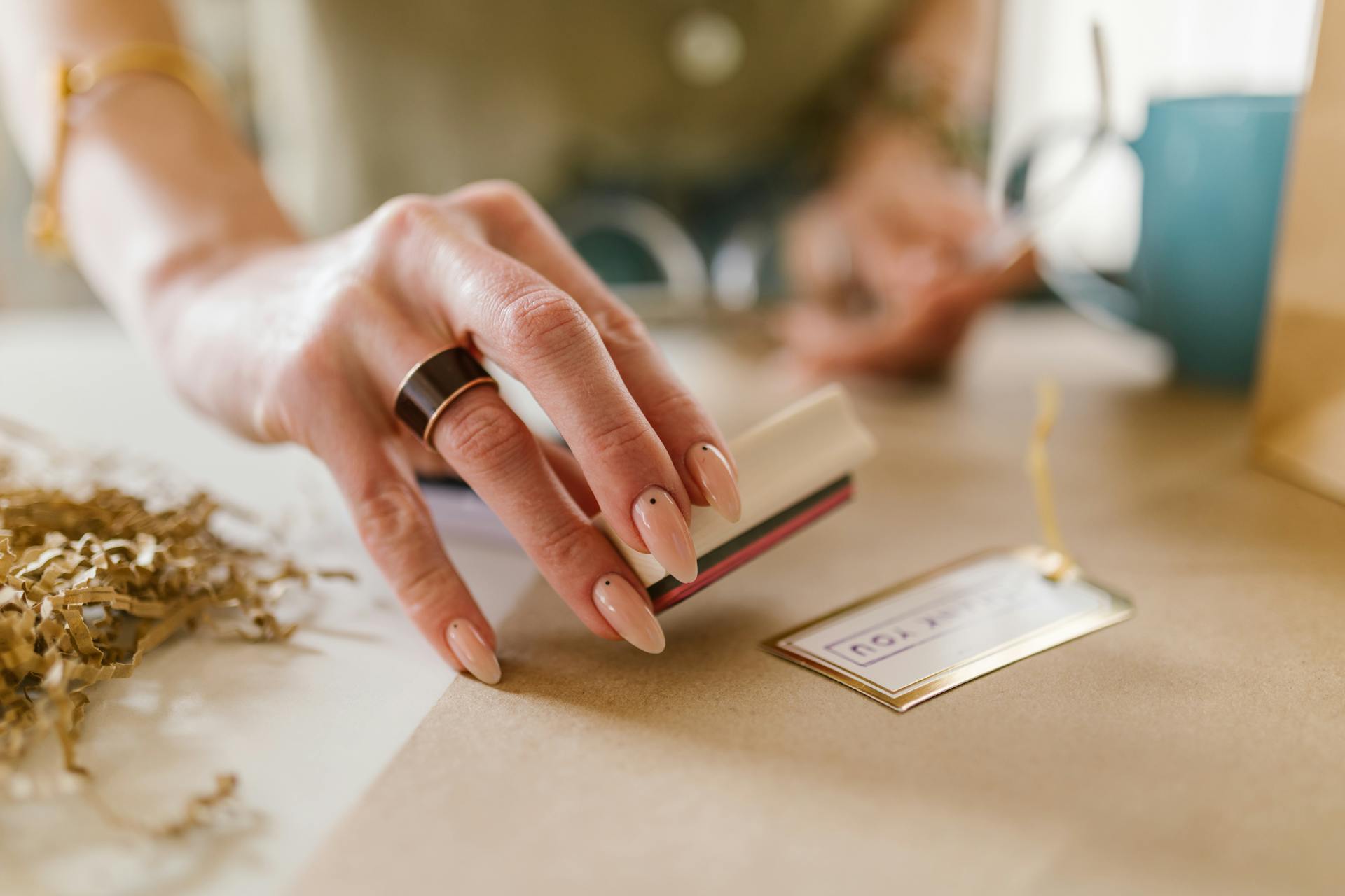 A Person Holding a Stamper