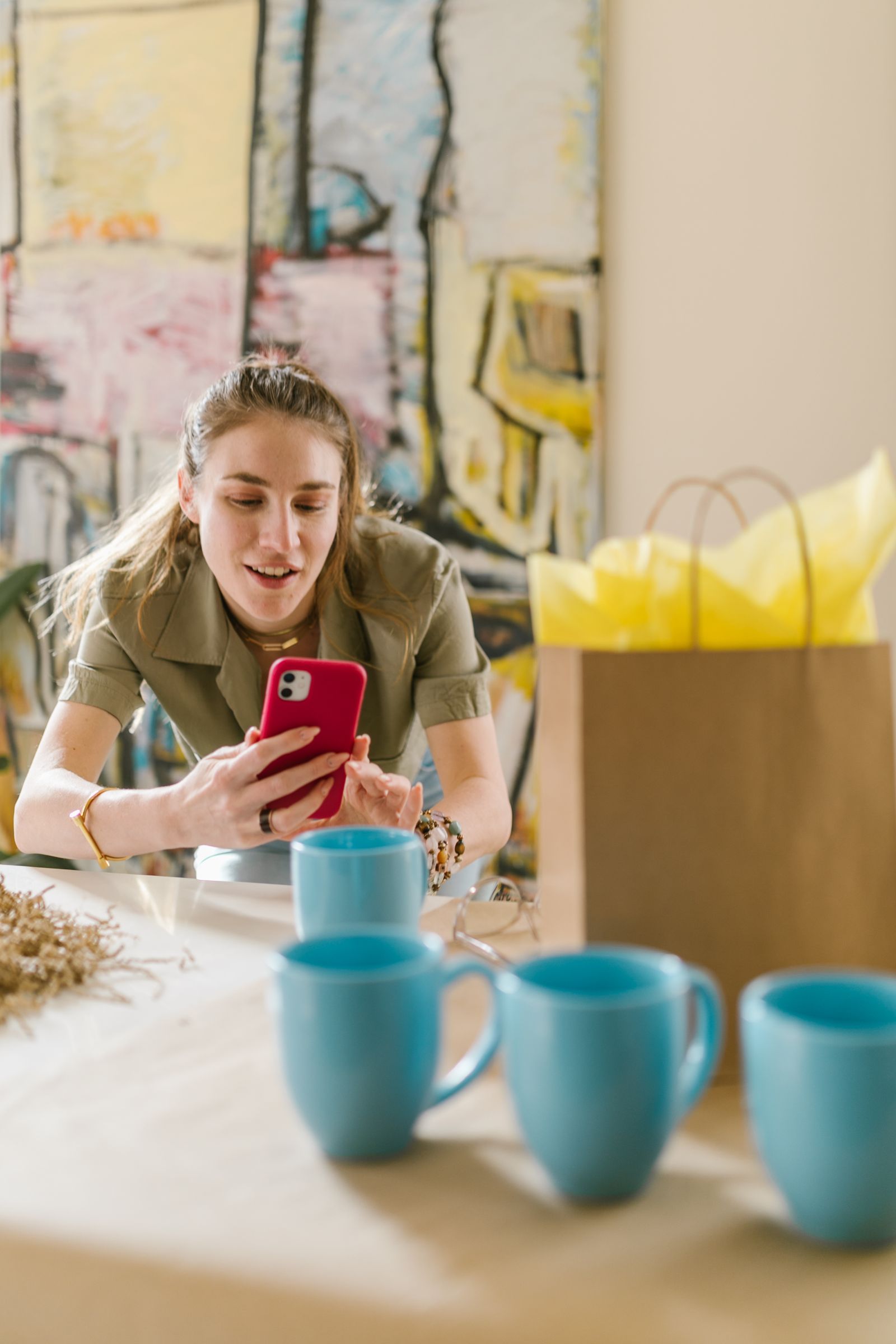Small business owner photographing a product with a smartphone for online selling