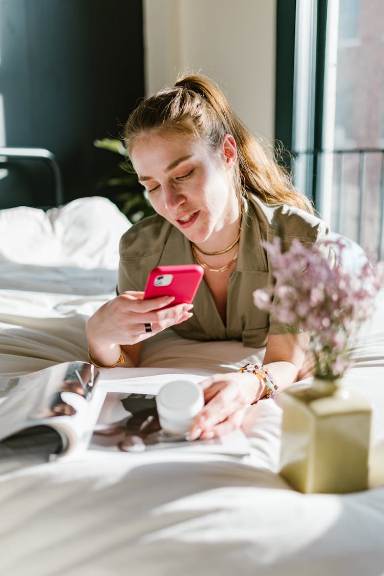 Woman Taking A Picture Using A Smartphone