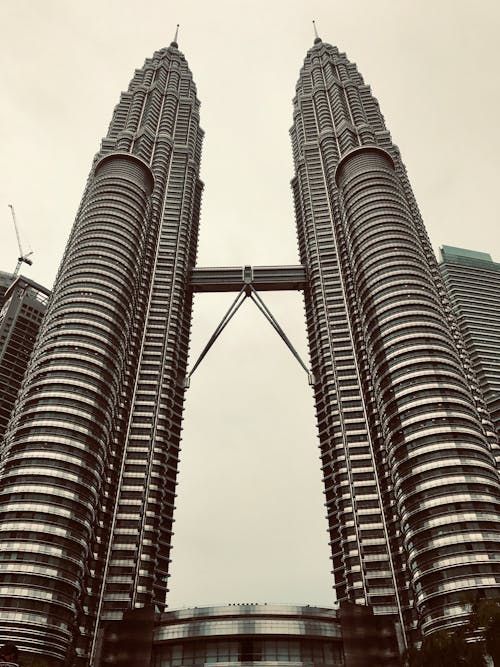 Free Low-Angle Shot of Petronas Twin Towers in Kuala Lumpur, Malaysia
 Stock Photo